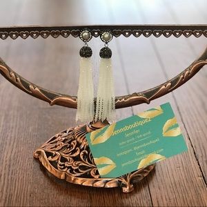 White tassel earrings